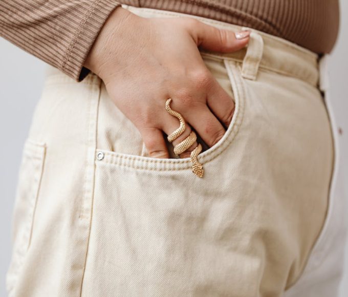 A Hand Wearing Snake Jewelry-Gthic.com