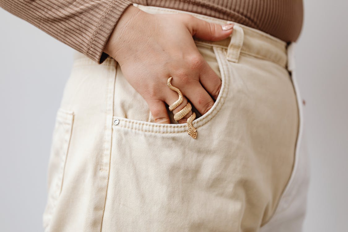 A Hand Wearing Snake Jewelry-Gthic.com