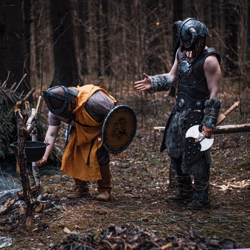 two Viking warriors with Viking weapons in their hands - Gthic.com
