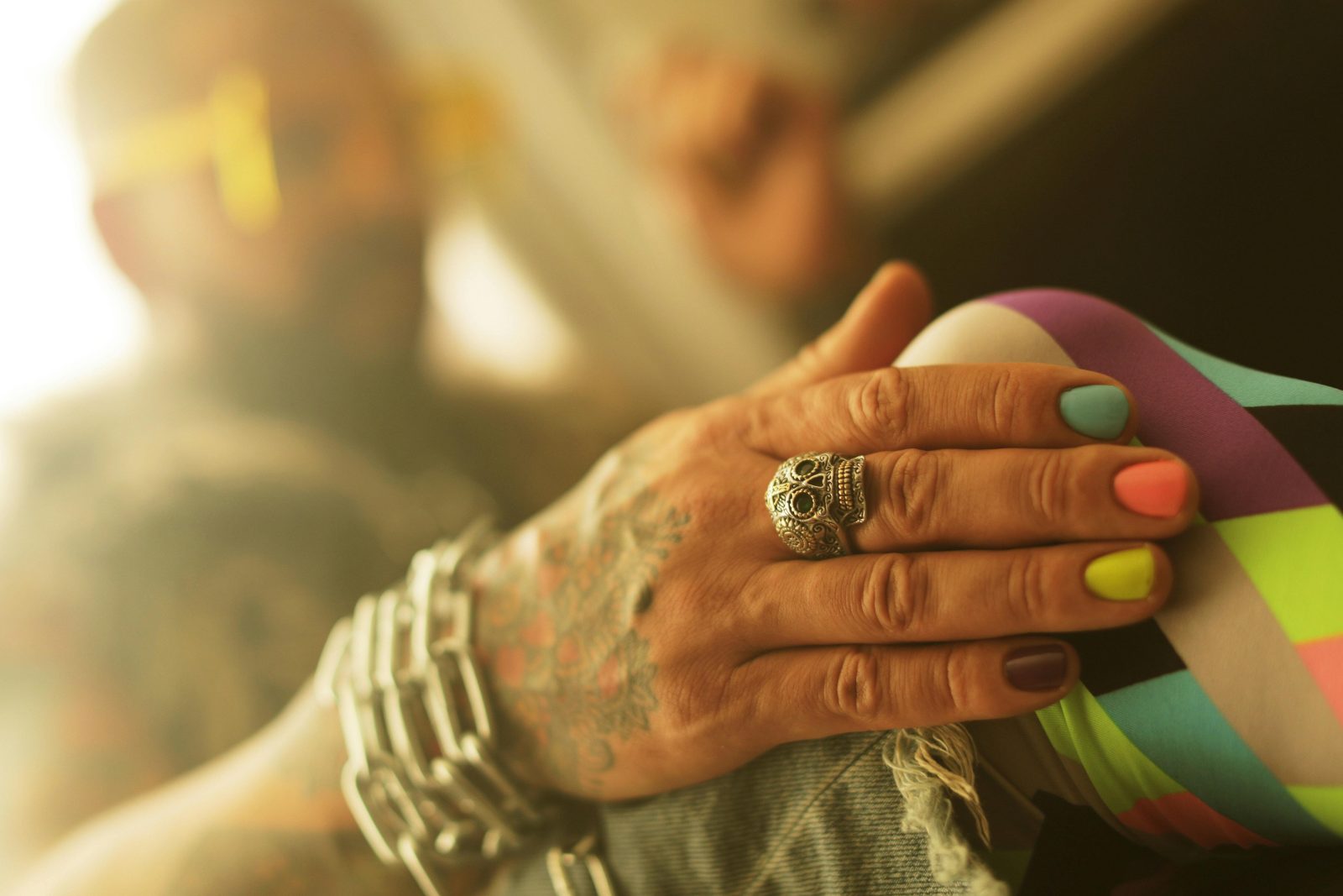 skull ring on man's hand