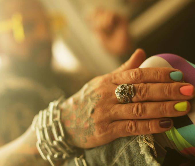 skull ring on man's hand