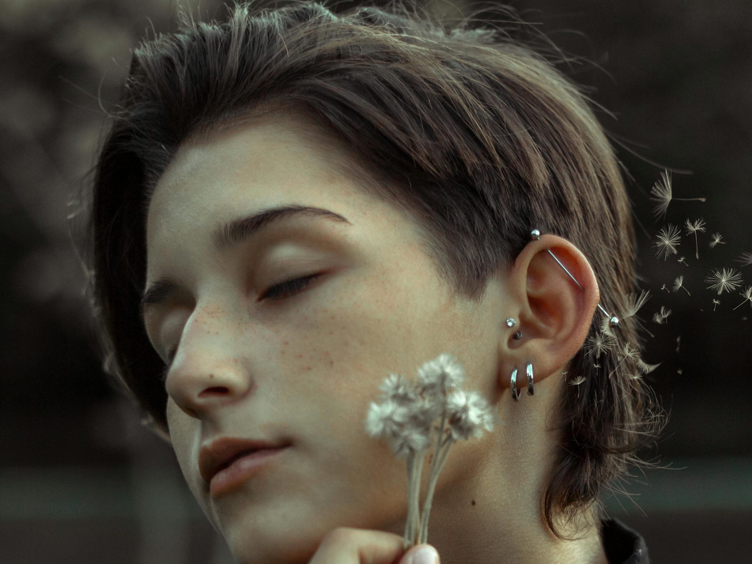 a woman with industrial piercing